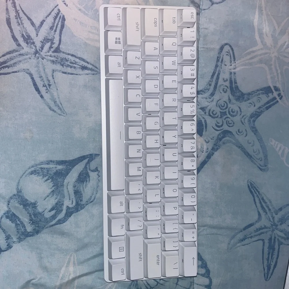 Brand new huntsman mini gaming keyboard never used.
